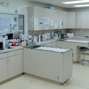 Organized clinic workspace with equipment