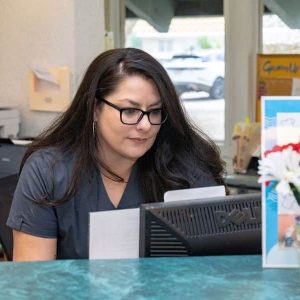 Receptionist working at the front desk